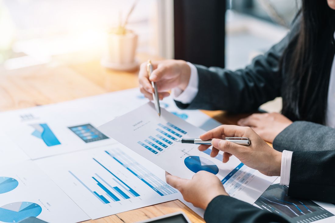 A commercial team analysing data together